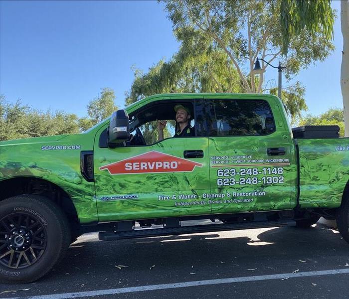 green SERVPRO pickup truck